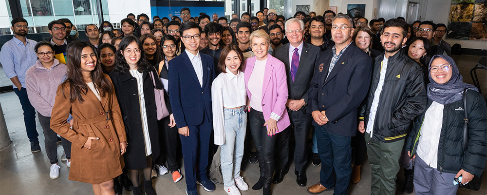 ANU Chancellor Julie Bishop and Vice-Chancellor Brian Schmidt with recipients of the Chancellor’s International Scholarship at a reception in aMBUSH Gallery at ANU.