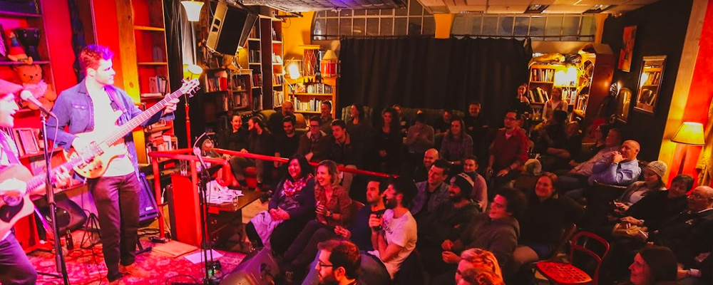 A band plays on the stage at Smith's Alternative.