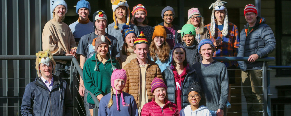 Bo and the rest of the Tuckwell Scholars pose while wearing colourful beanies.